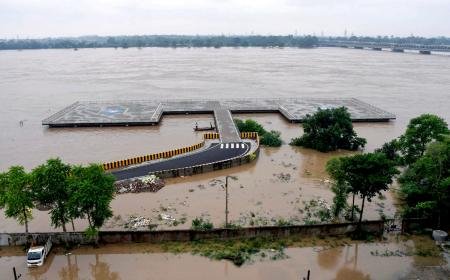 up-minister-ganga-feet-remark-flood-controversy